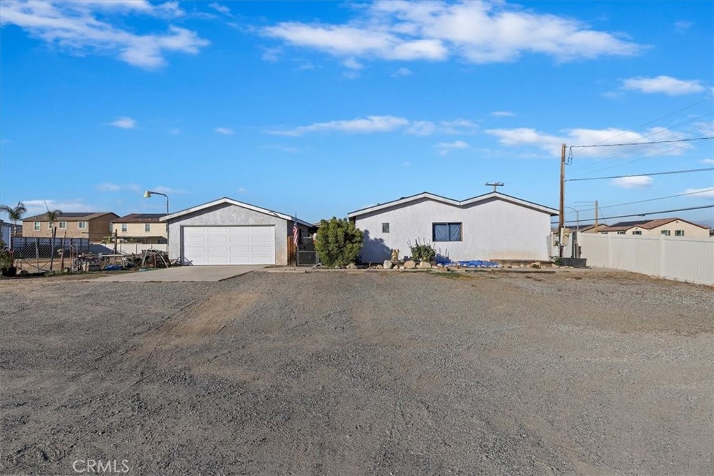 16915 Wood Road Riverside, CA 92508 - Photo 13 of 43 a house view with a street