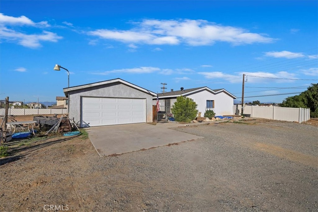 16915 Wood Road Riverside, CA 92508 - Photo 14 of 43 a view of a house with a street