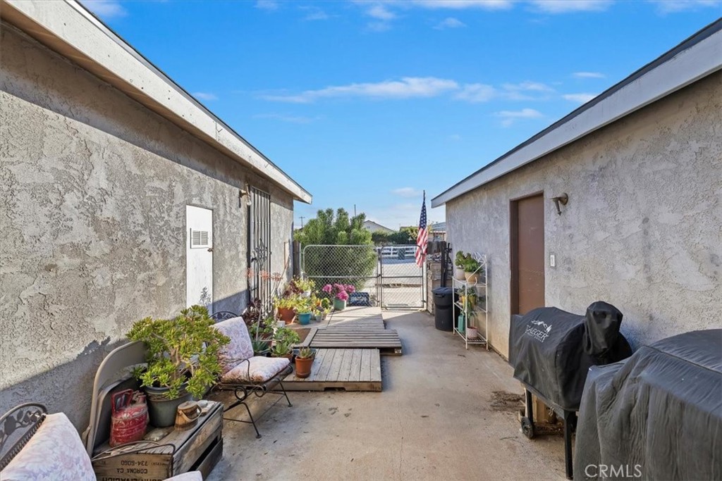16915 Wood Road Riverside, CA 92508 - Photo 22 of 43 a backyard of a house with outdoor seating