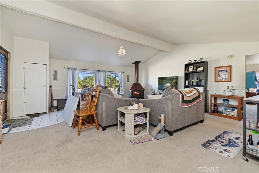 16915 Wood Road Riverside, CA 92508 - Photo 25 of 43 a living room with furniture and a gym