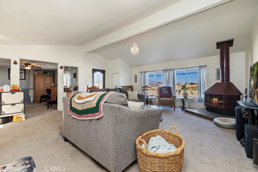 16915 Wood Road Riverside, CA 92508 - Photo 26 of 43 a living room with furniture and a lamp
