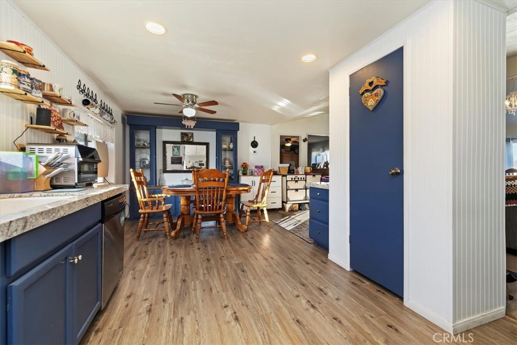 16915 Wood Road Riverside, CA 92508 - Photo 33 of 43 a view of a dining room with furniture window and wooden floor