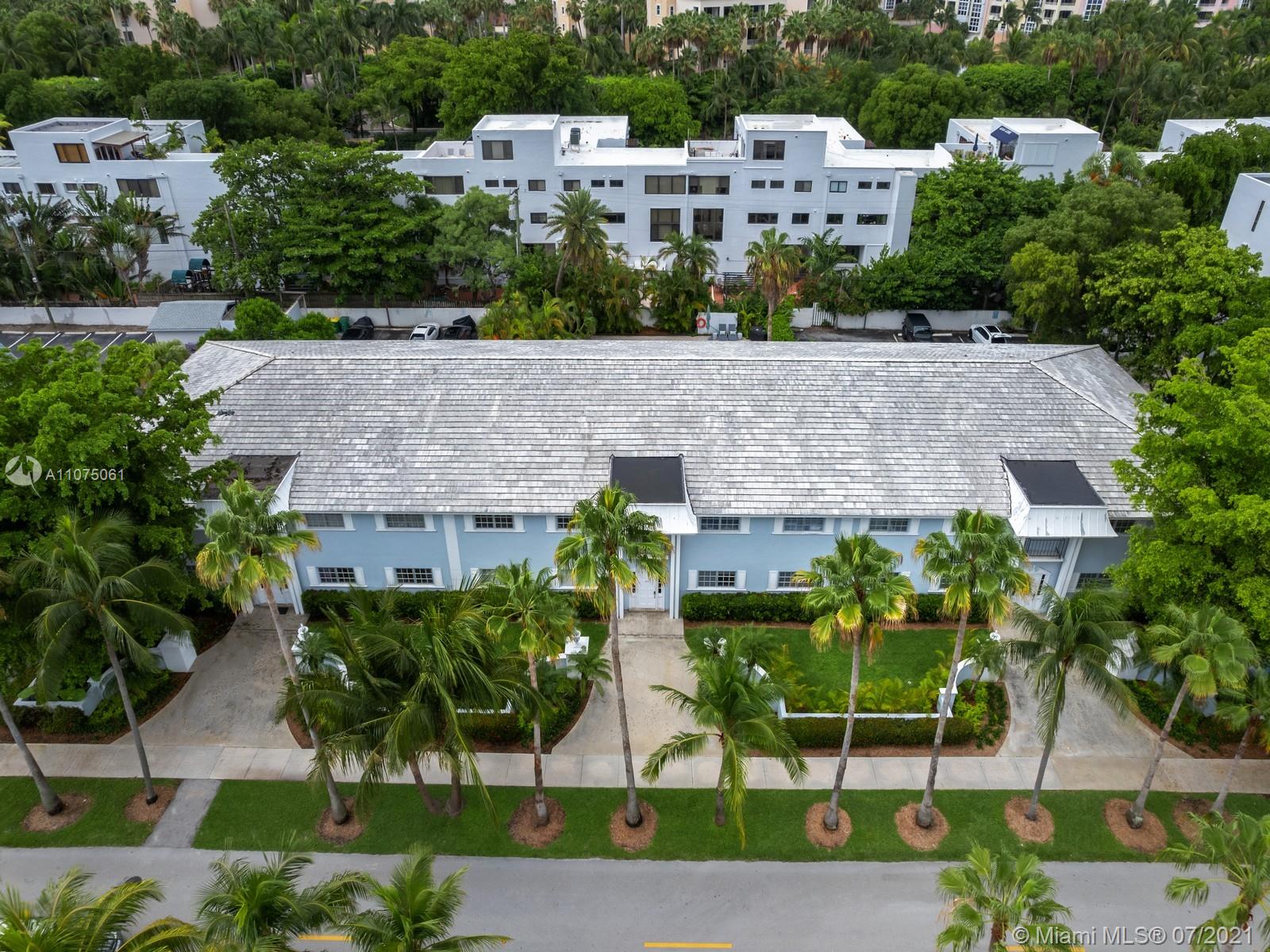 202 Sunrise Drive Key Biscayne, FL 33149 - Photo 6 of 12 an aerial view of a house with garden space and street view