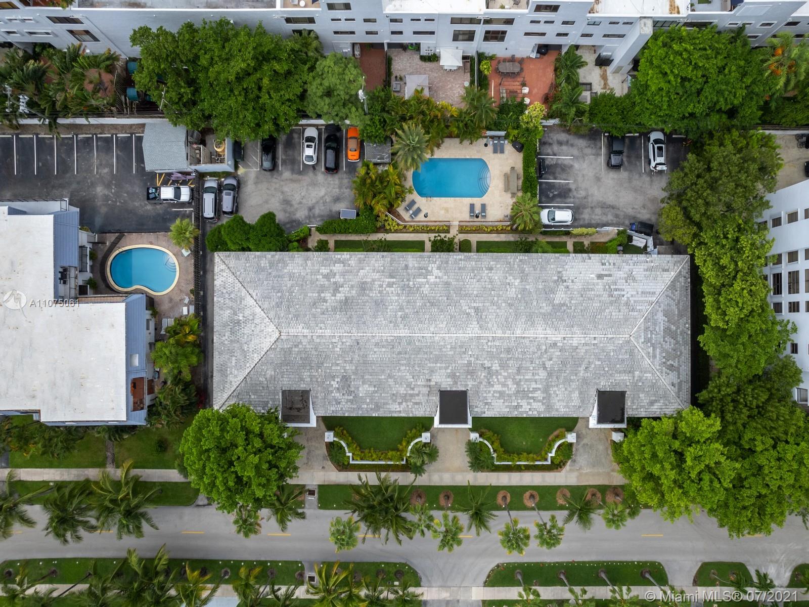 202 Sunrise Drive Key Biscayne, FL 33149 - Photo 10 of 12 an aerial view of a house with swimming pool and outdoor seating