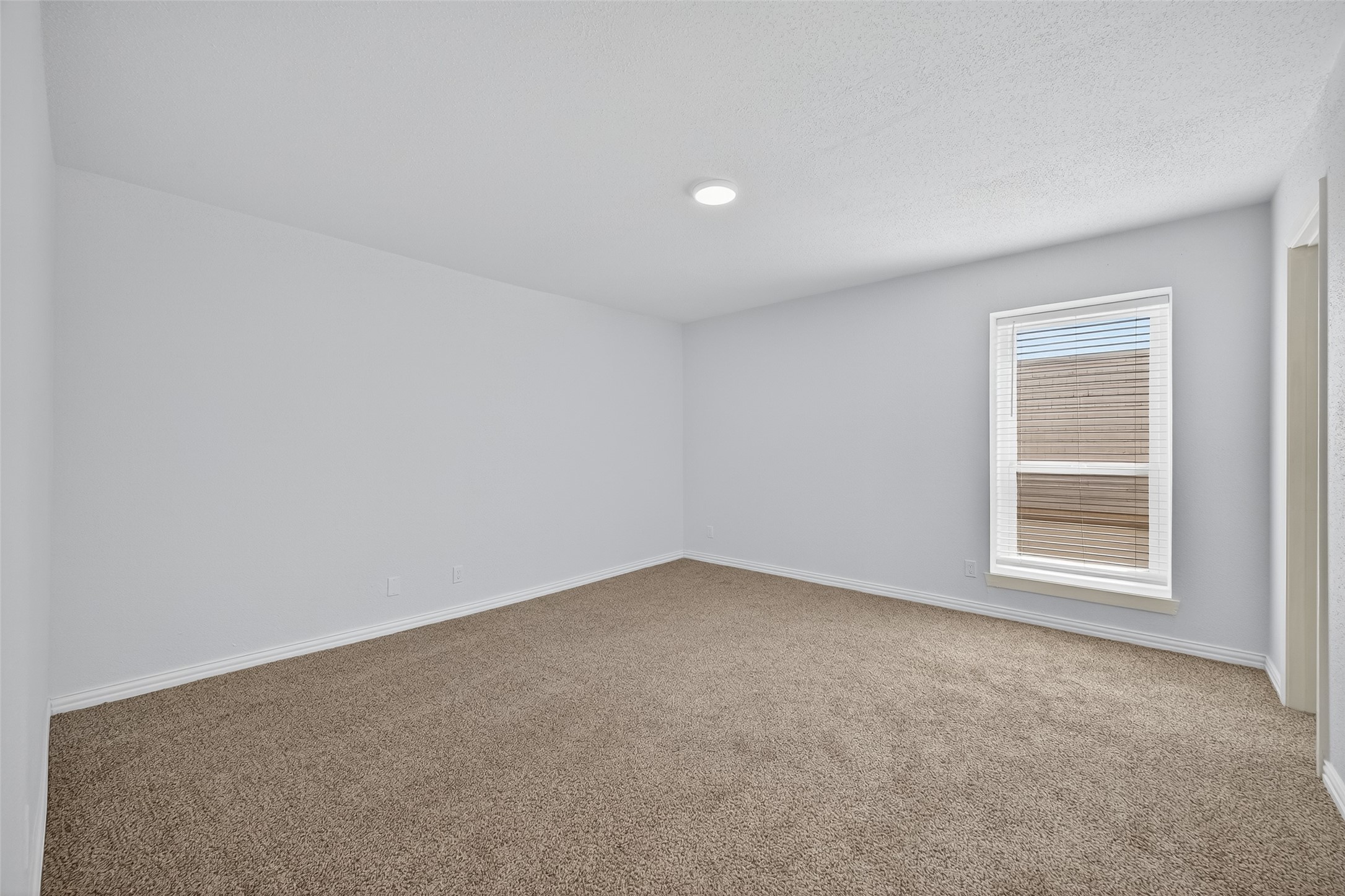 6201 Ranchester Drive, Unit 29 Houston, TX 77036 - Photo 14 of 33 an empty room with a window