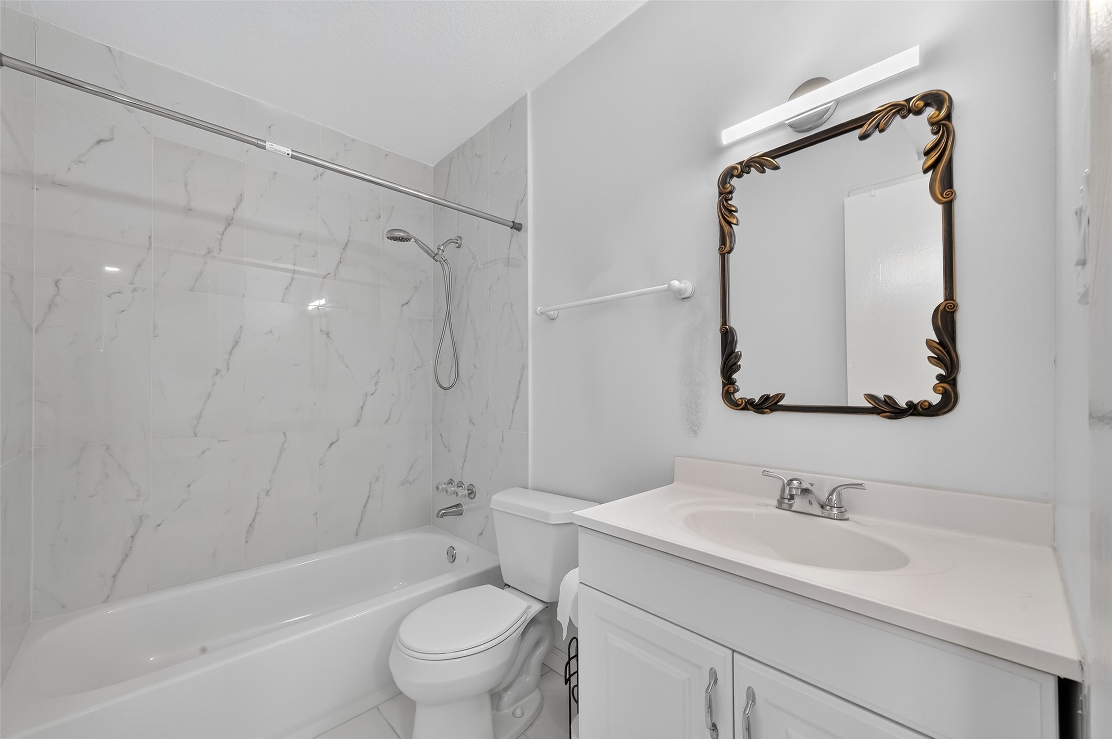 6201 Ranchester Drive, Unit 29 Houston, TX 77036 - Photo 17 of 33 a bathroom with a sink toilet and shower