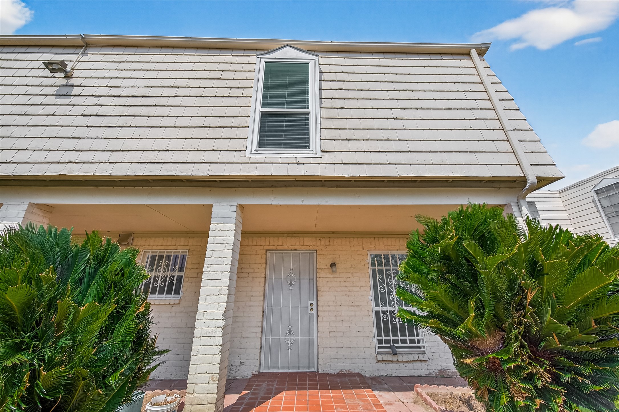 6201 Ranchester Drive, Unit 29 Houston, TX 77036 - Photo 2 of 33 a view of a house with a garage