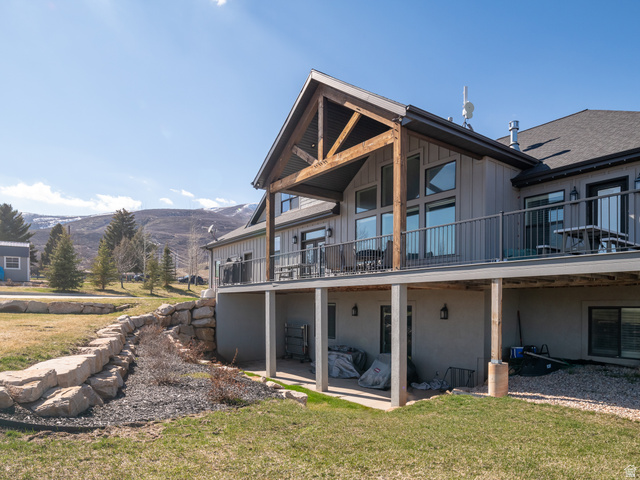 641 West 500 South Midway, UT 84049 - Photo 52 of 52 Contemporary exterior featuring a covered deck with metal railings and exposed timber framing