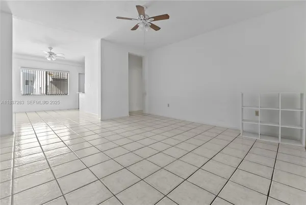 a view of an empty room and window