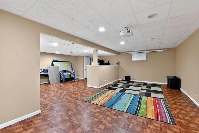 a very nice looking bedroom with a rug