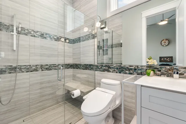 a utility room with sink dryer and washer