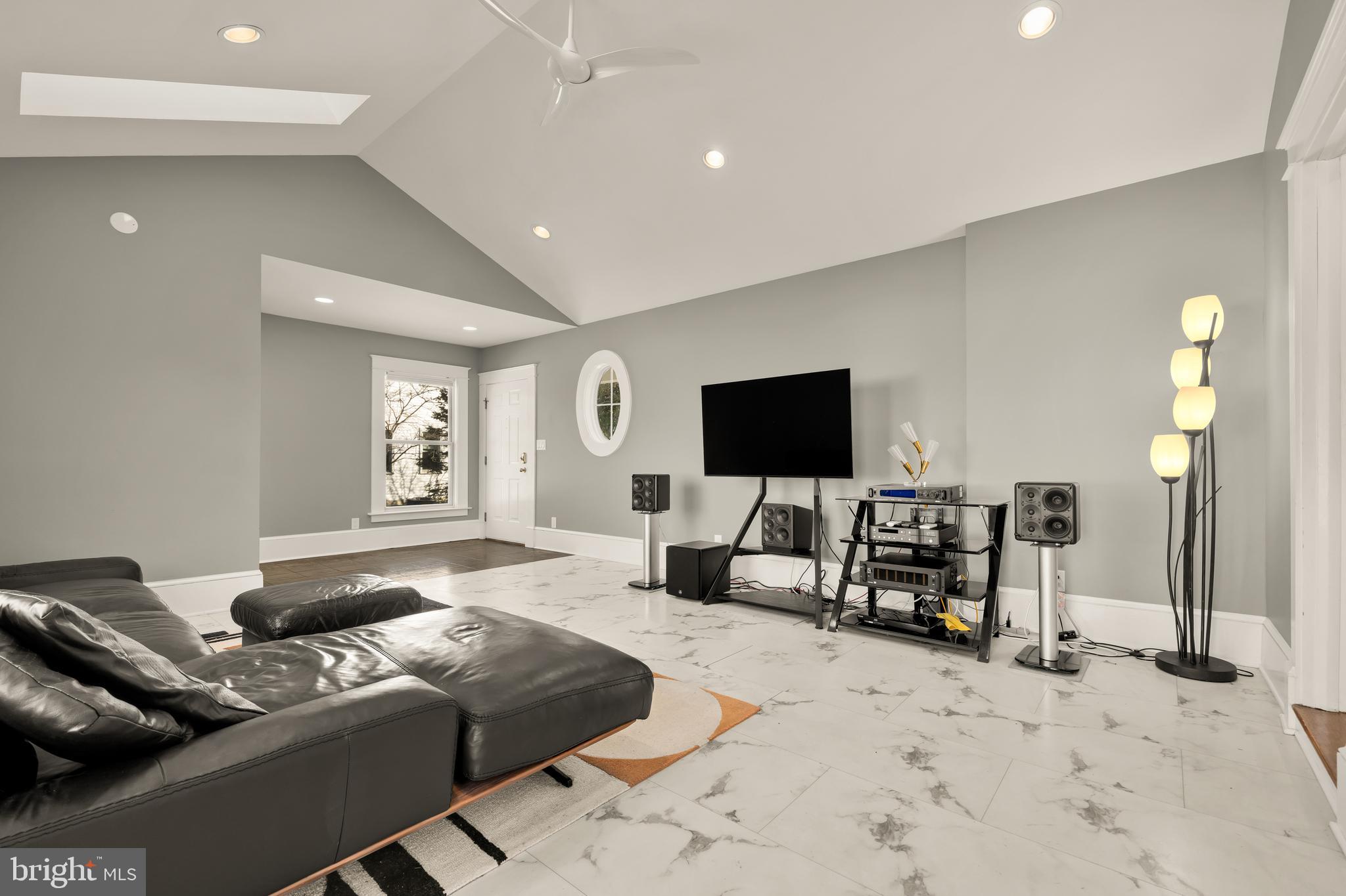 1308 Lawrence Street Northeast Washington, DC 20017 - Photo 21 of 43 a bedroom with furniture and a flat screen tv