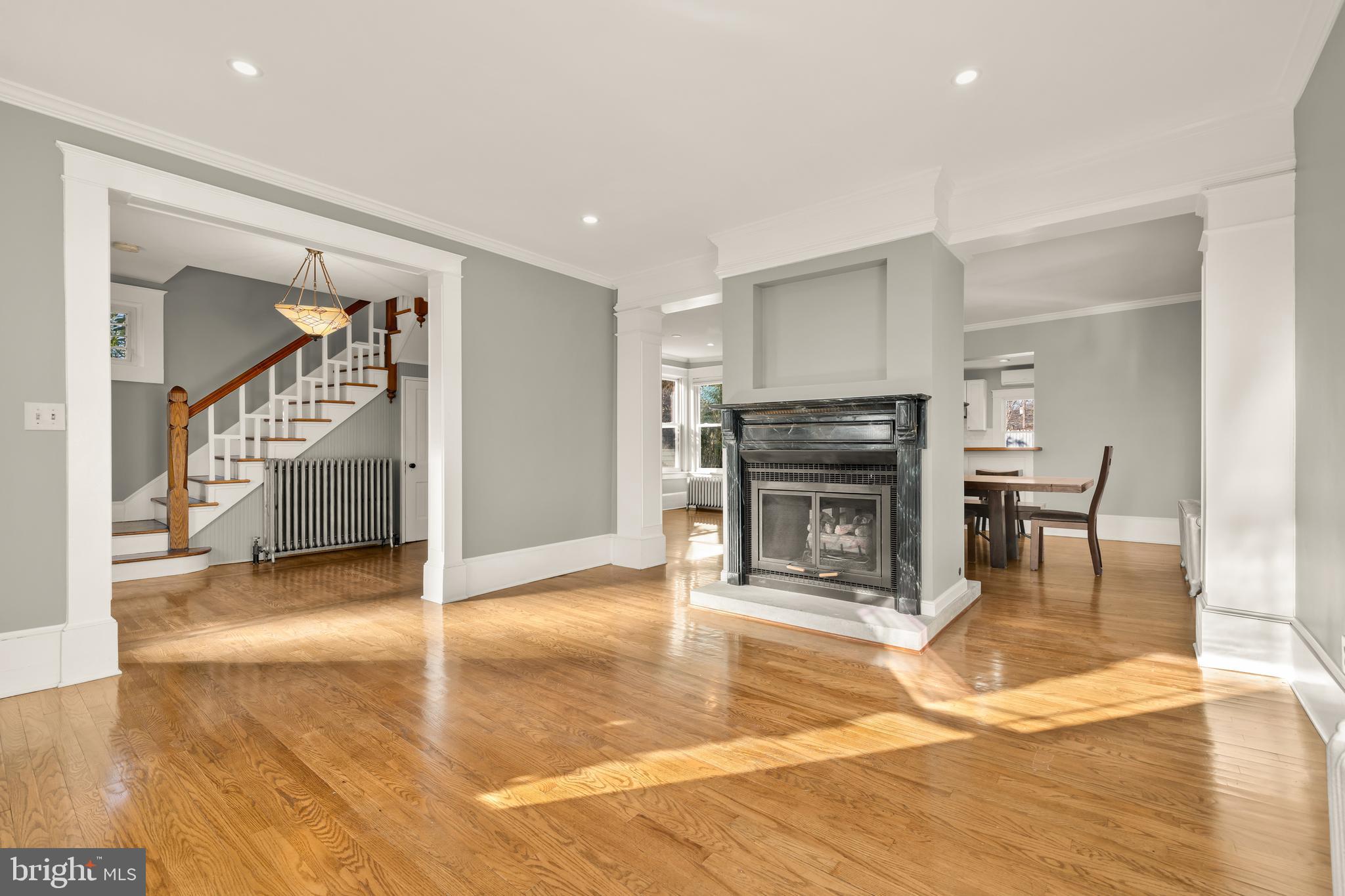1308 Lawrence Street Northeast Washington, DC 20017 - Photo 7 of 43 a living room with furniture and a fireplace