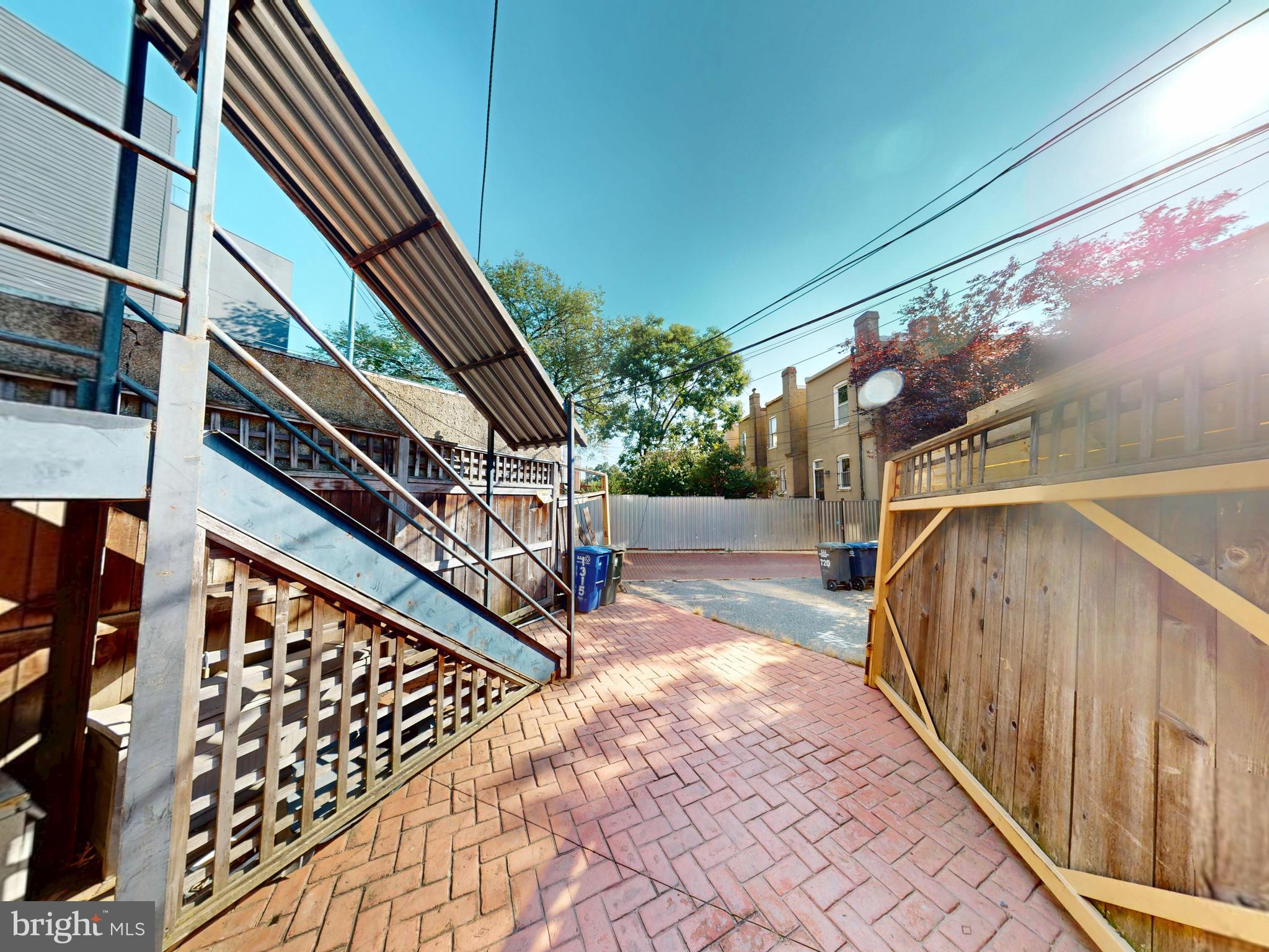 1315 Pennsylvania Ave. Southeast, Unit B Washington, DC 20003 - Photo 15 of 19 a view of a house with a small yard