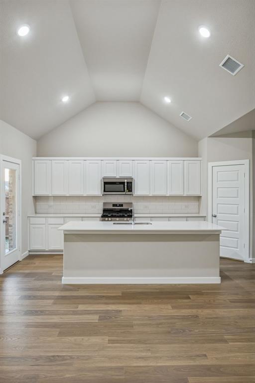 1404 Companero Street Haslet, TX 76052 - Photo 9 of 40 Kitchen in the Wimbledon home plan by Trophy Signature Homes – REPRESENTATIVE PHOTO