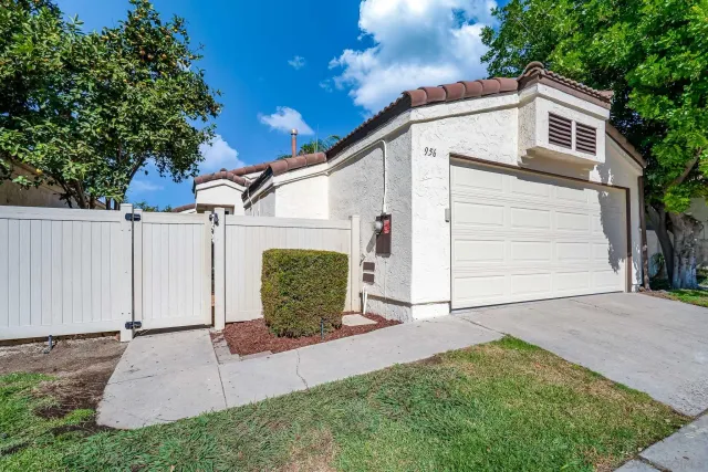 a view of a back yard of the house