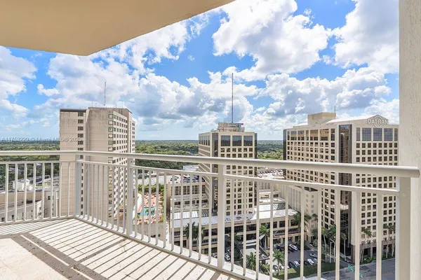 a view of a large building with a city view