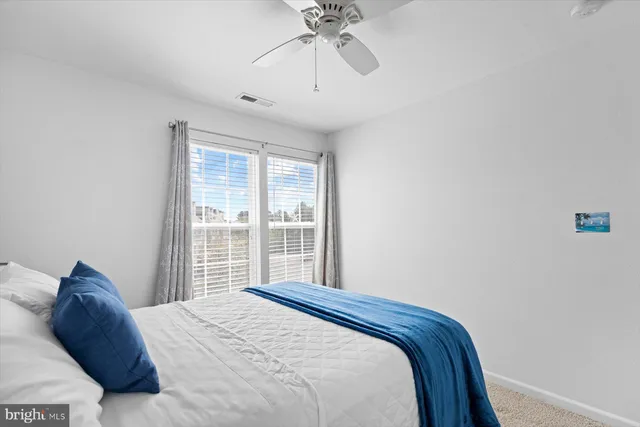 a view of a balcony with wooden floor