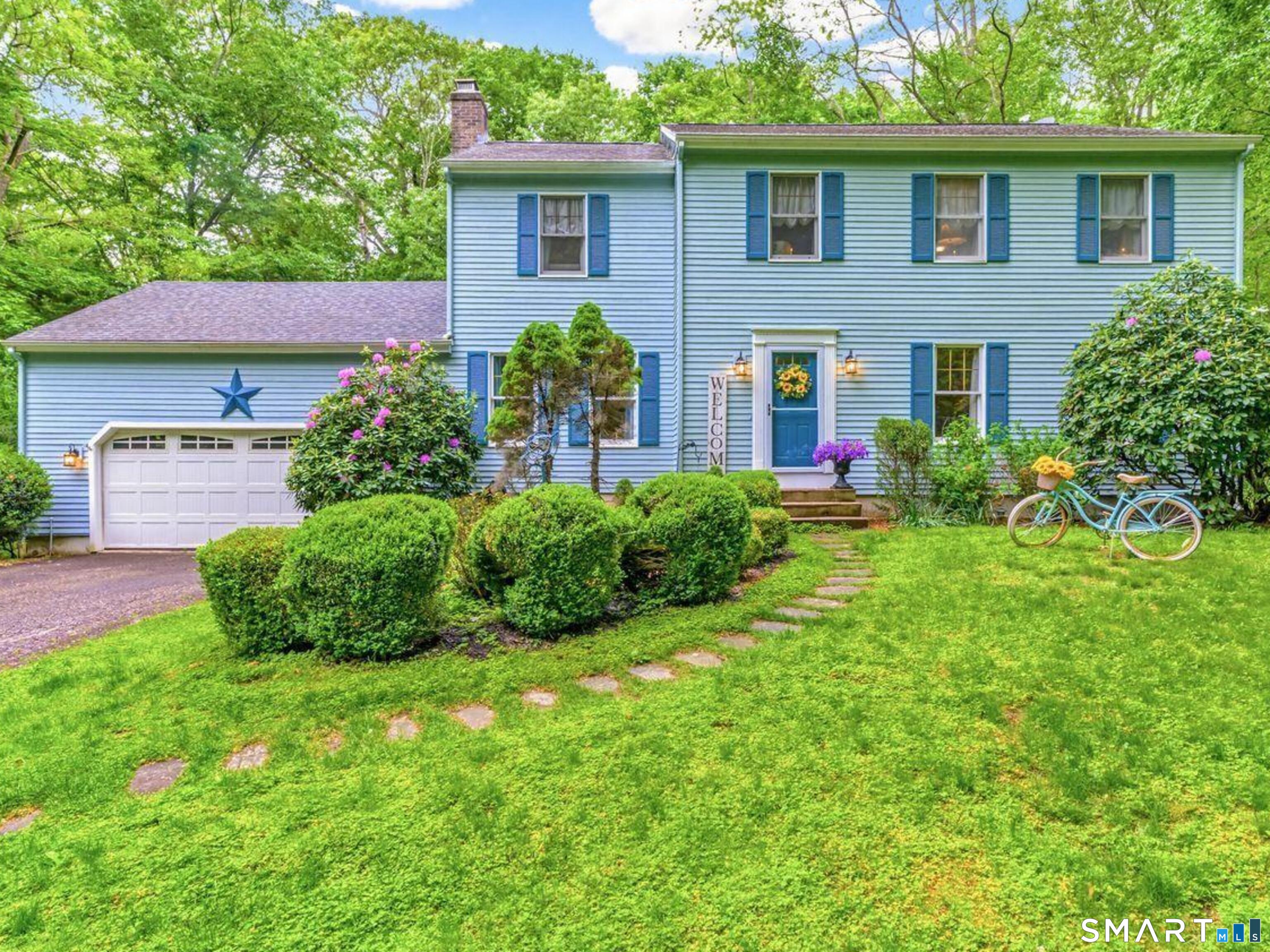 Prominently Set On 1.5 Acres In A Private Natural Setting