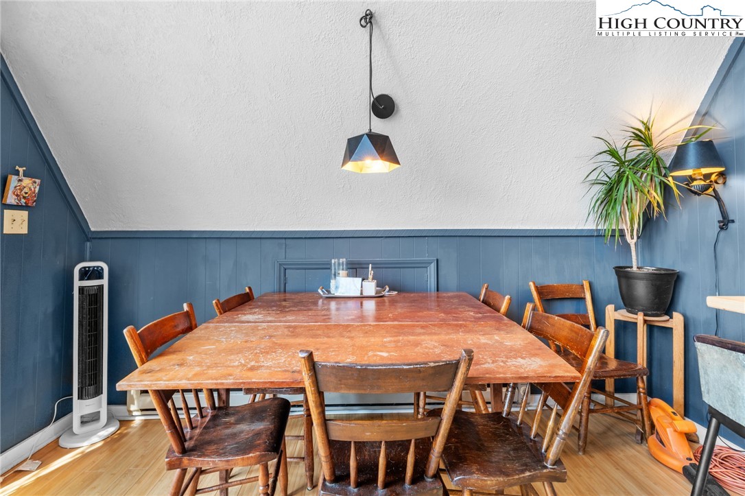 179 Rhododendron Drive Beech Mountain, NC 28604 - Photo 15 of 44 a dining room with furniture and window