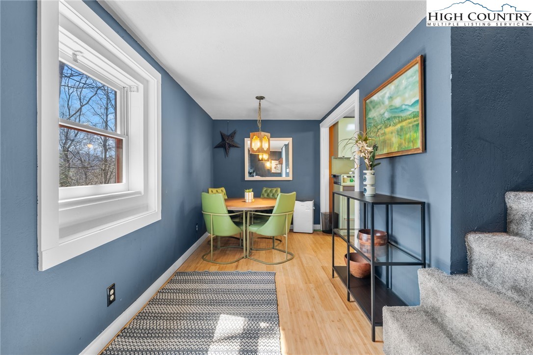 179 Rhododendron Drive Beech Mountain, NC 28604 - Photo 20 of 44 a view of a livingroom with furniture workspace and a window