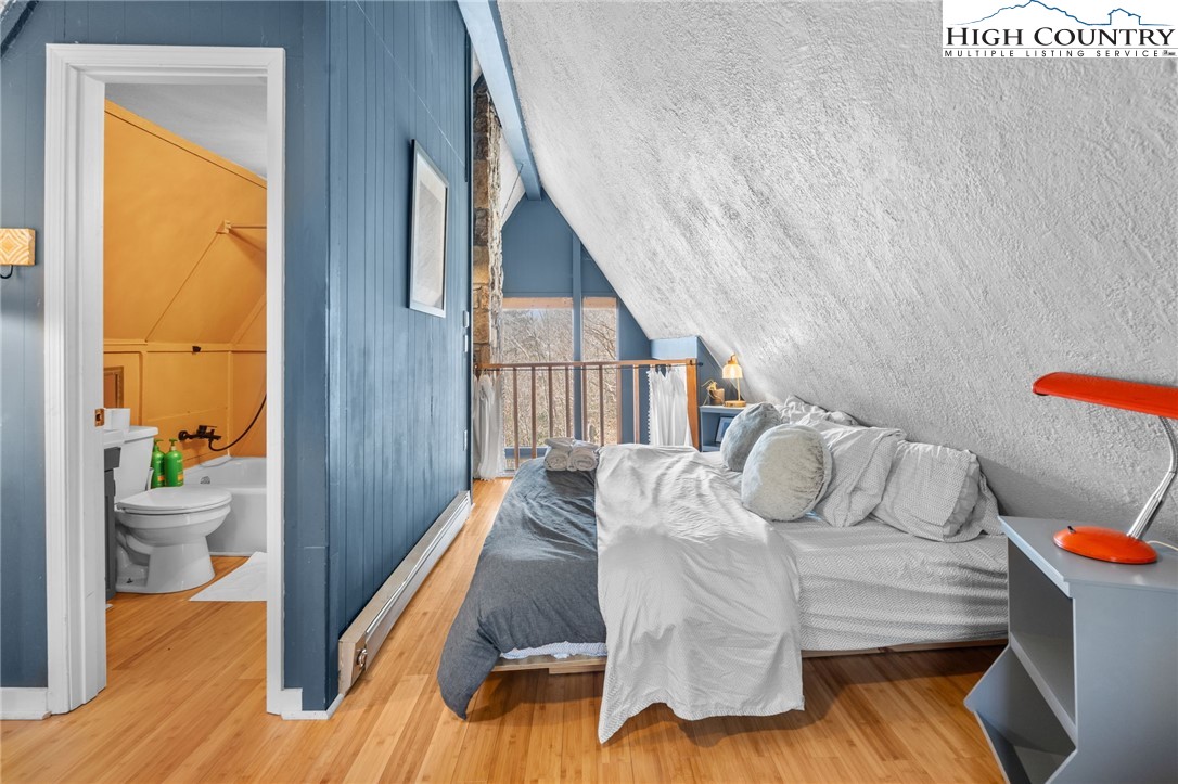 179 Rhododendron Drive Beech Mountain, NC 28604 - Photo 36 of 44 a living room with furniture and a bathroom