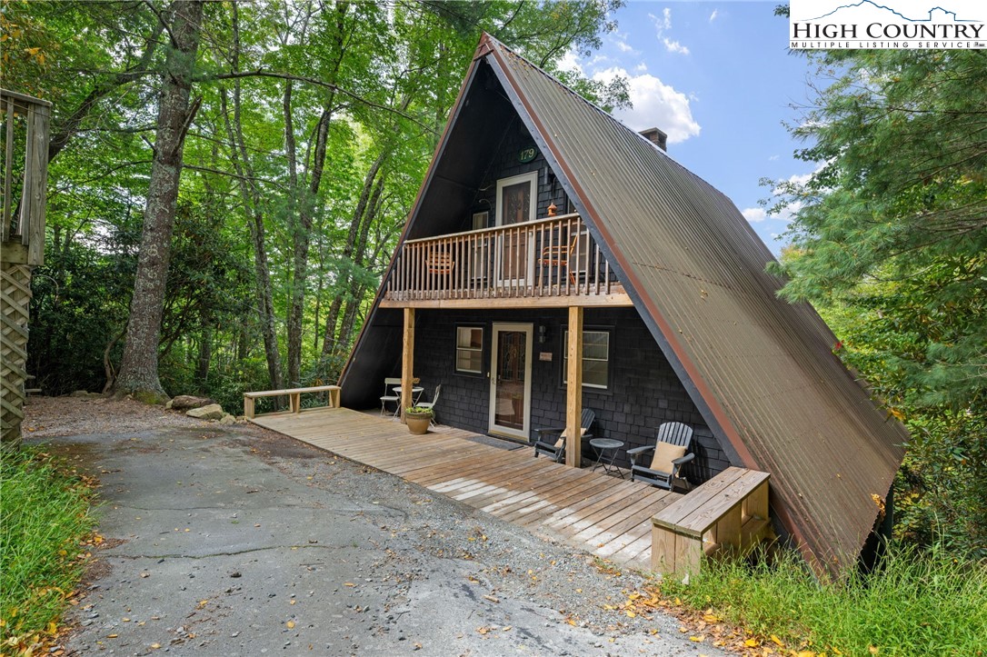 179 Rhododendron Drive Beech Mountain, NC 28604 - Photo 38 of 44 a view of a house with a yard