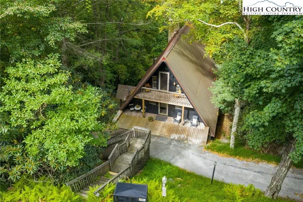a house with trees in the background