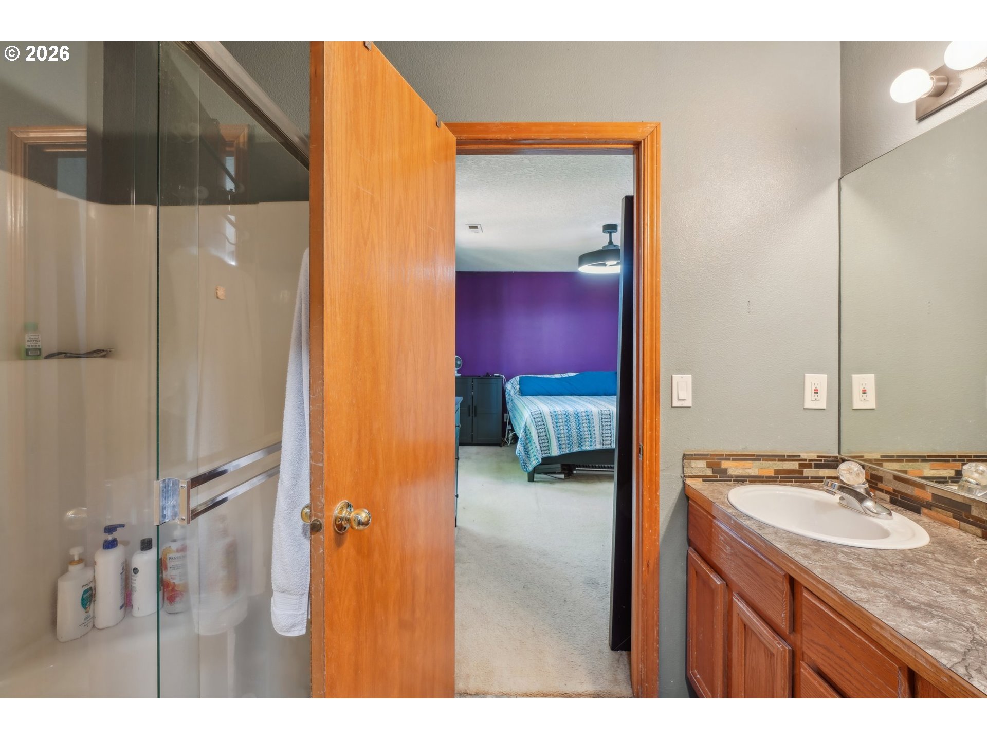 4055 Northeast 13th Terrace Gresham, OR 97030 - Photo 29 of 37 a bathroom with a granite countertop sink and a mirror