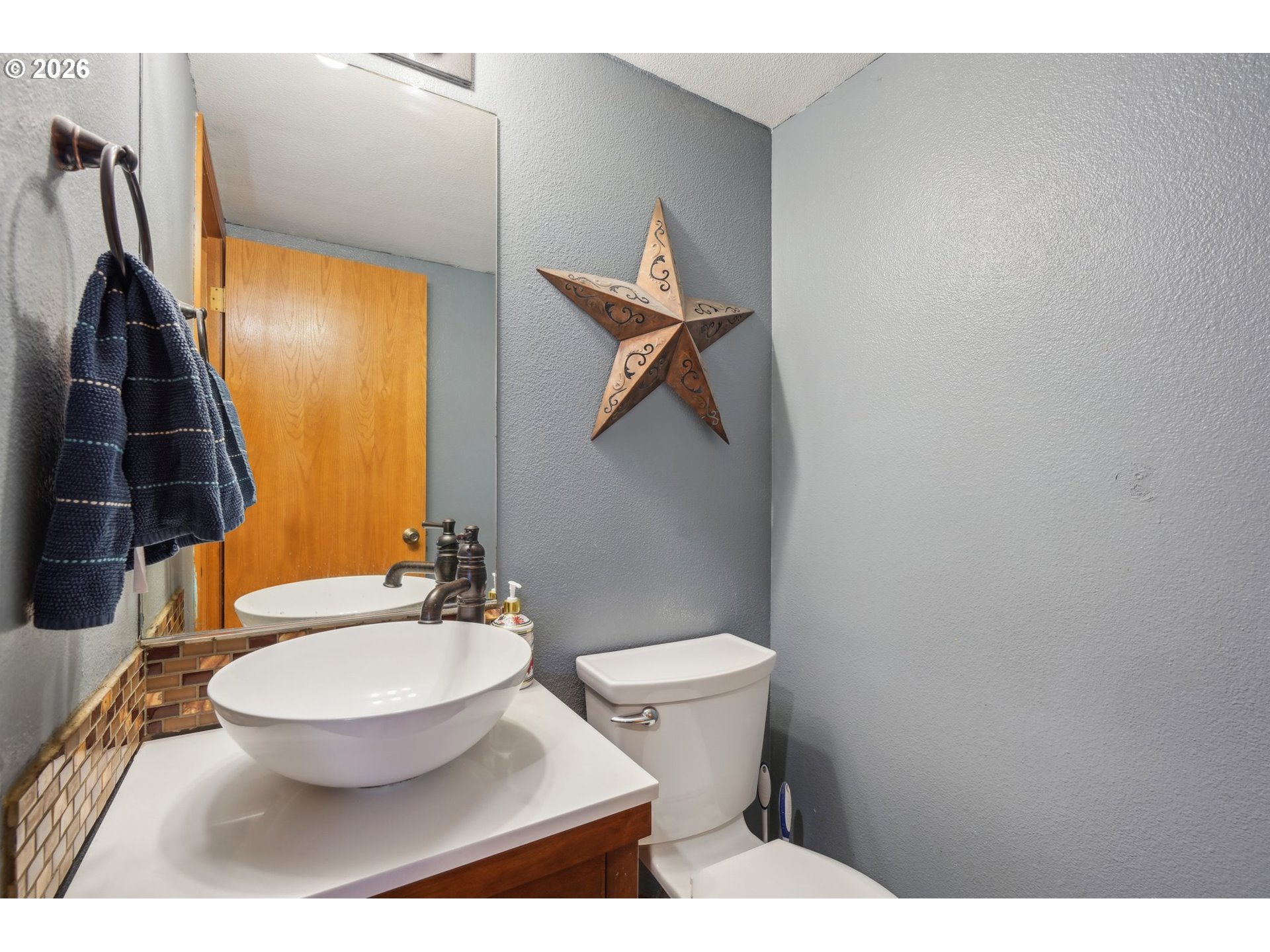 4055 Northeast 13th Terrace Gresham, OR 97030 - Photo 30 of 37 a bathroom with a toilet and a sink
