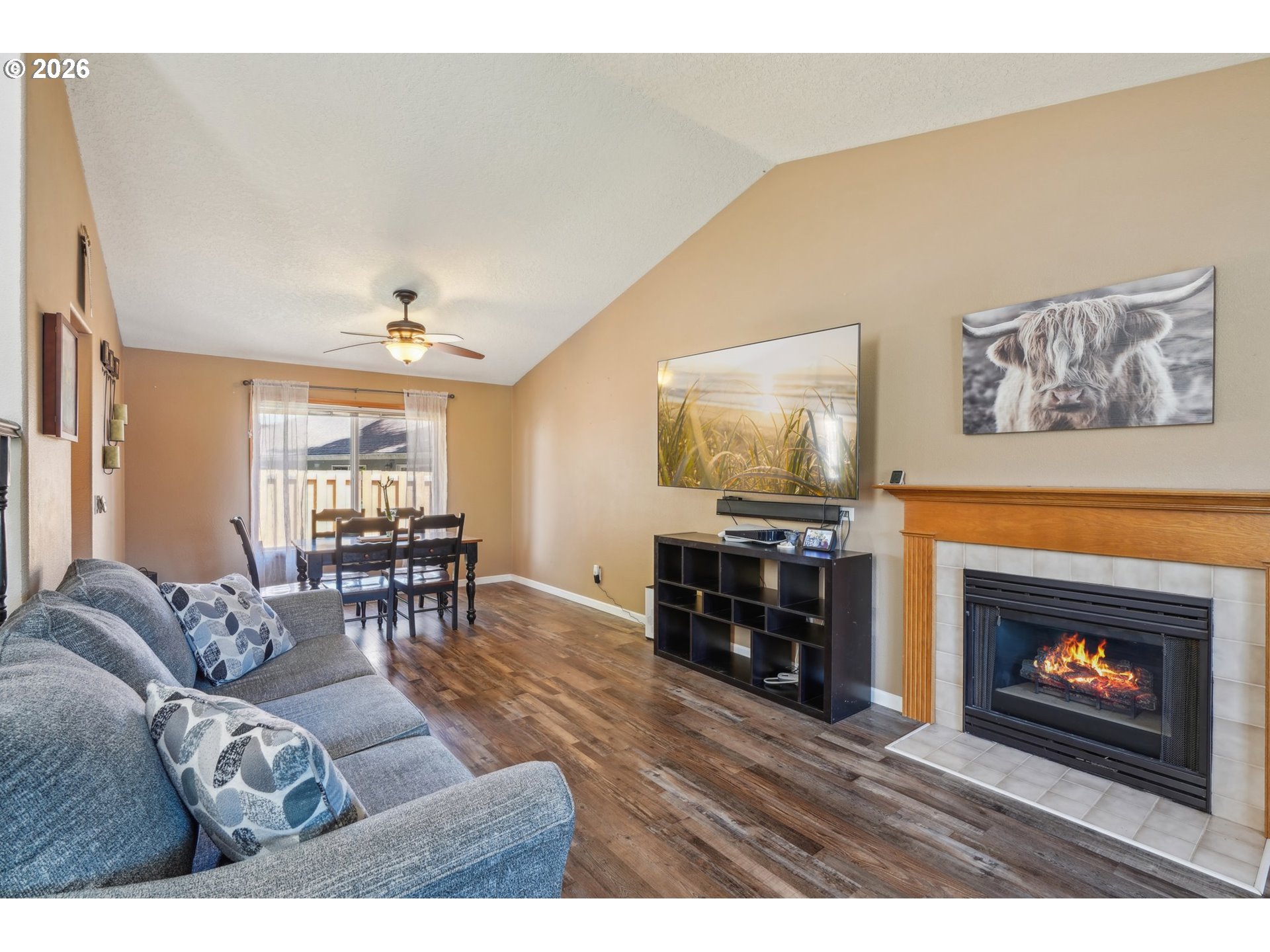 4055 Northeast 13th Terrace Gresham, OR 97030 - Photo 7 of 37 a living room with furniture and a fireplace