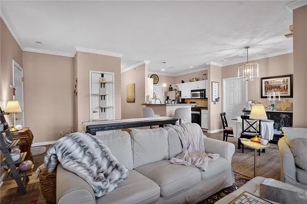 a living room with furniture and a table