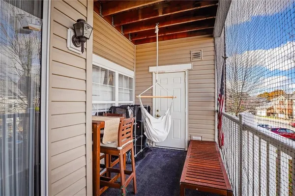 a view of a balcony with street