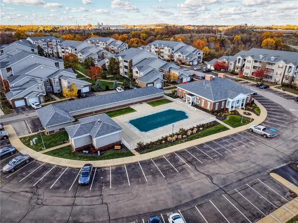 a view of a swimming pool with a lounge chair