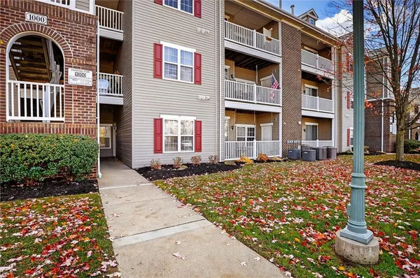 a front view of a multi story residential apartment building