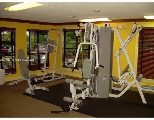 Palm Aire Gardens Condominiums Pompano Beach, FL 33069 - Photo 5 of 14 a room with musical instruments