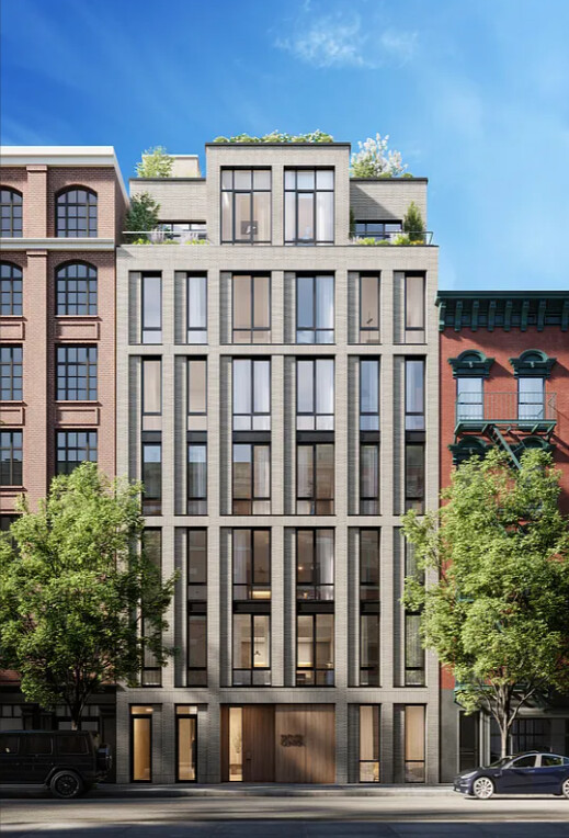 66 Clinton Street, Unit 5A Manhattan, NY 10002 - Photo 8 of 15 a front view of a multi story building