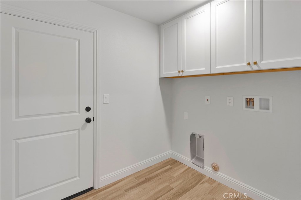 9432 Wasco Hesperia, CA 92345 - Photo 19 of 45 a view of cabinets and wooden floor