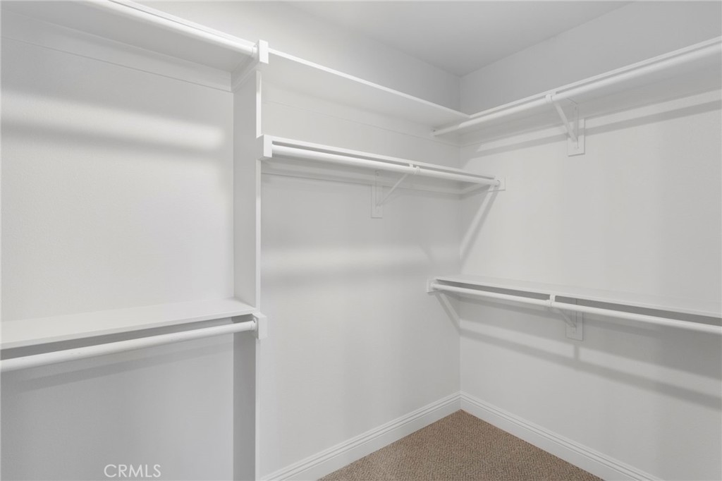 9432 Wasco Hesperia, CA 92345 - Photo 27 of 45 a view of an empty walk in closet