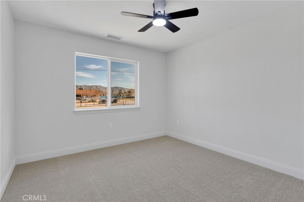 9432 Wasco Hesperia, CA 92345 - Photo 30 of 45 an empty room with a window