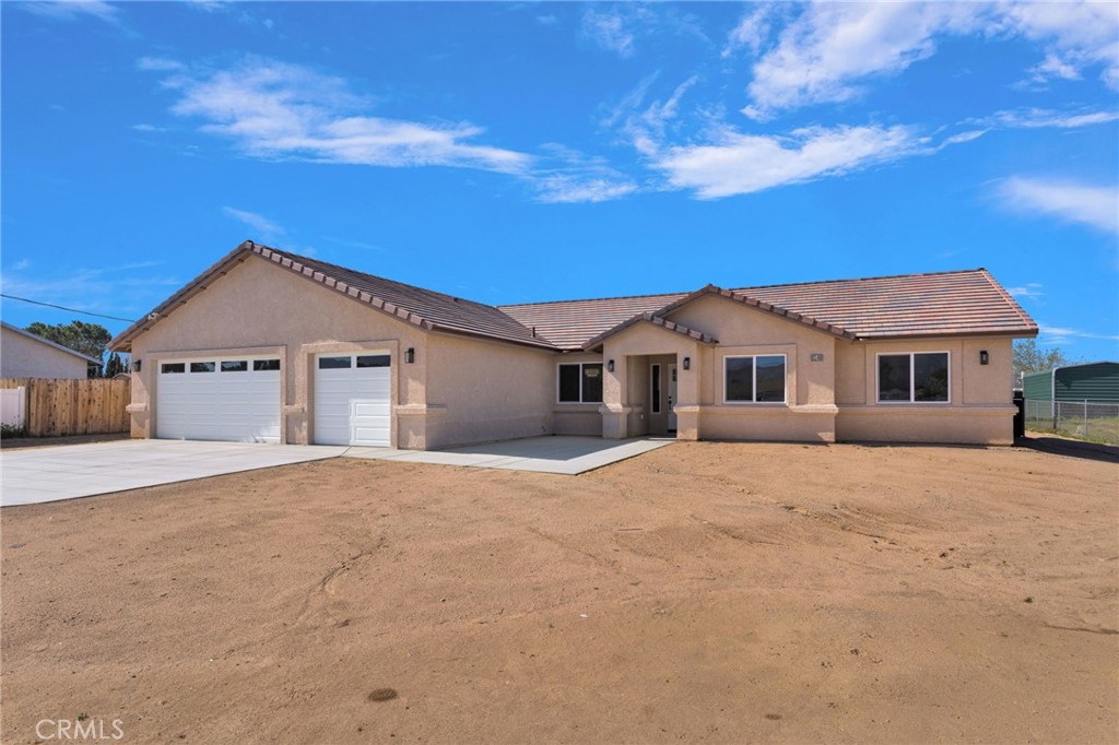 9432 Wasco Hesperia, CA 92345 - Photo 3 of 45 a large white house with a yard