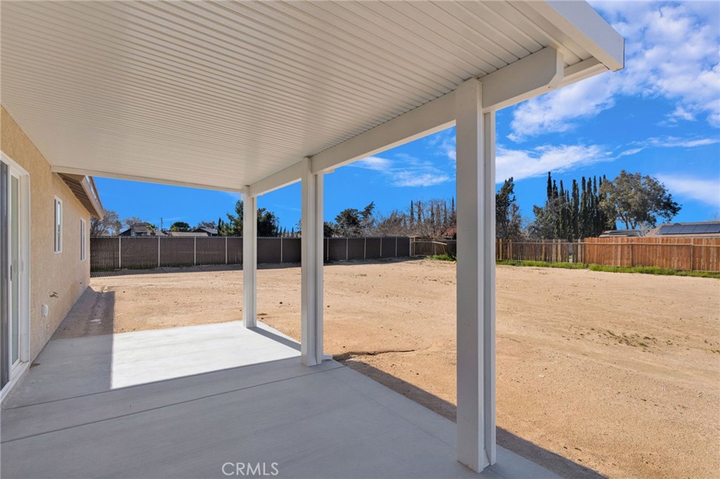 9432 Wasco Hesperia, CA 92345 - Photo 38 of 45 a view of a patio with a table and chairs