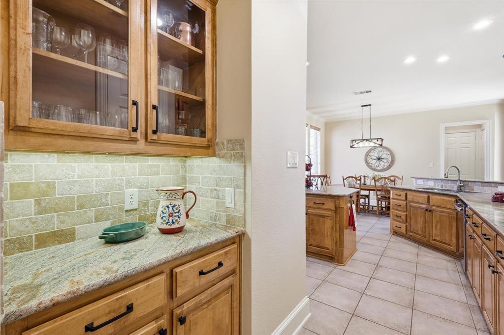 4629 Manor Way Flower Mound, TX 75028 - Photo 15 of 40 Butlers pantry with glass fronts and extra storage