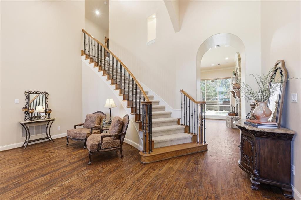 4629 Manor Way Flower Mound, TX 75028 - Photo 5 of 40 Sweeping staircase and combo formals grace the entry
