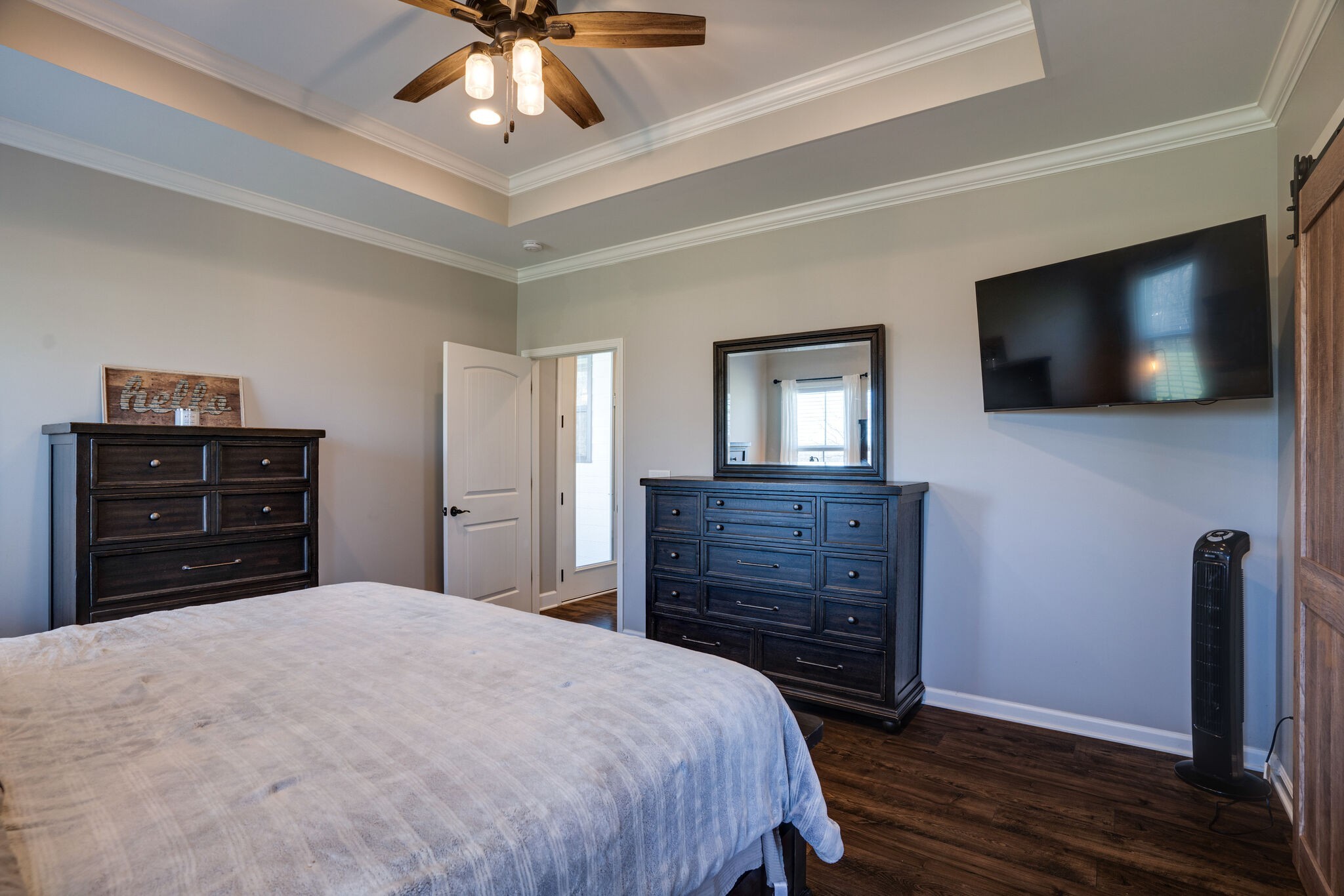 295 Ben Armstrong Road Castalian Springs, TN 37031 - Photo 21 of 44 a bedroom with a bed and a flat screen tv