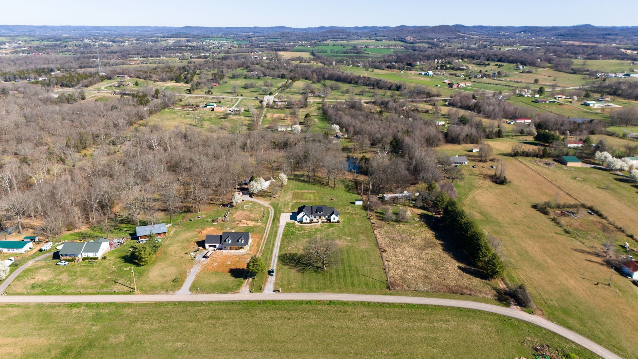 295 Ben Armstrong Road Castalian Springs, TN 37031 - Photo 3 of 44 an aerial view of residential houses with outdoor space