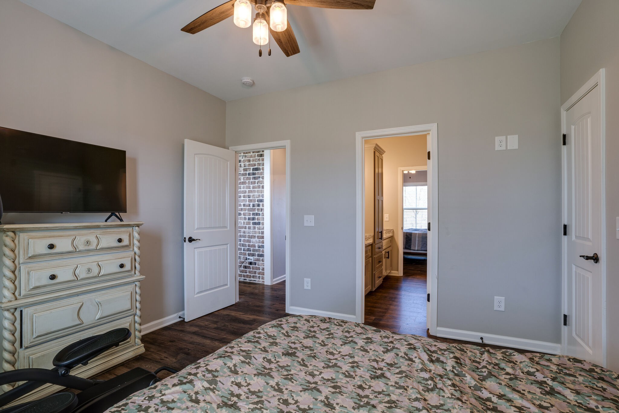 295 Ben Armstrong Road Castalian Springs, TN 37031 - Photo 32 of 44 a bedroom with a bed and a flat screen tv