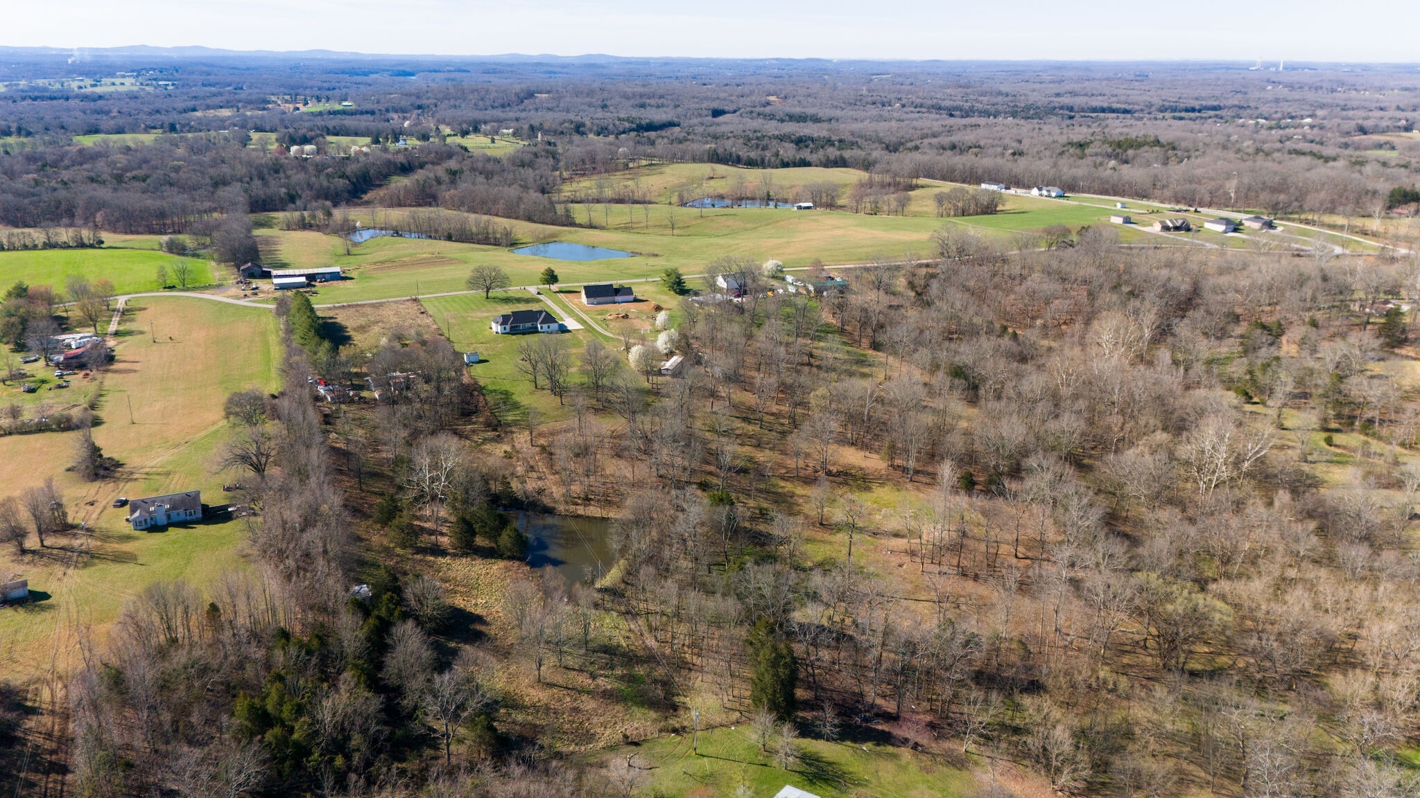 295 Ben Armstrong Road Castalian Springs, TN 37031 - Photo 43 of 44 a view of a lake with mountains in the background