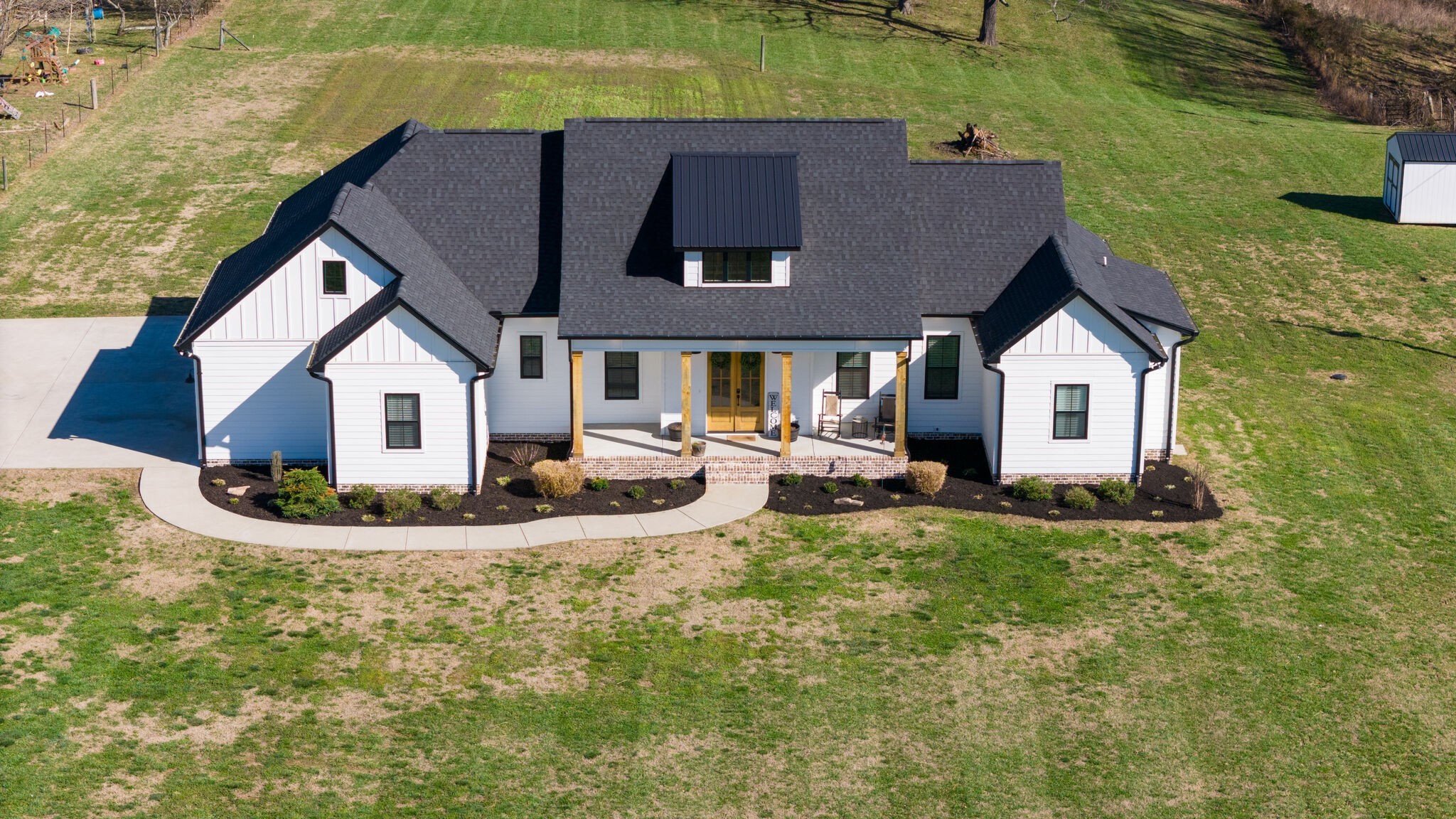 295 Ben Armstrong Road Castalian Springs, TN 37031 - Photo 6 of 44 a view of a house with a yard and sitting area