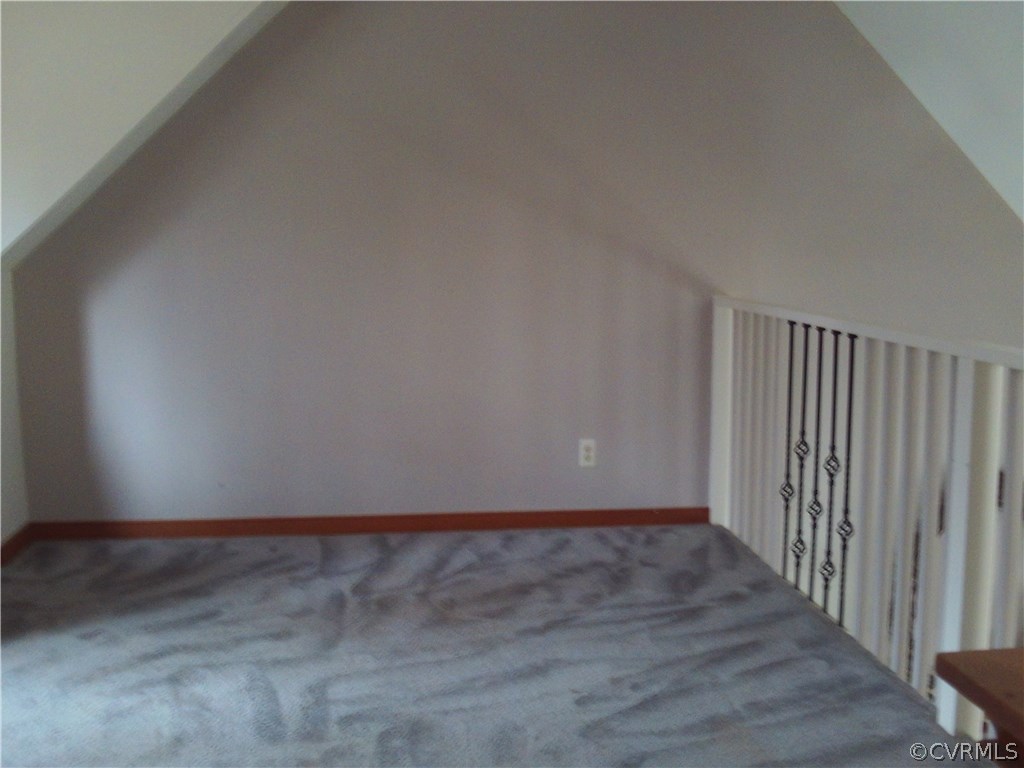 7029 Pointer Ridge Road Midlothian, VA 23112 - Photo 15 of 27 a view of an empty room with wooden floor